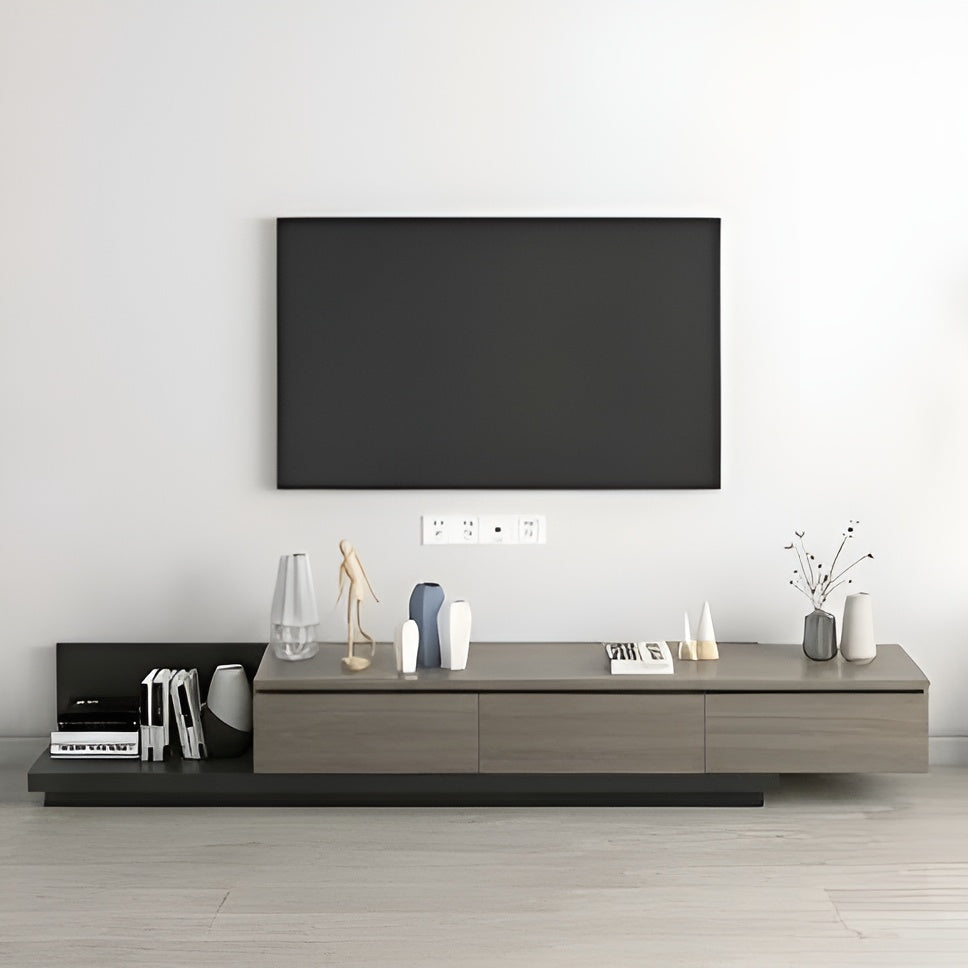 Modern living room with a television mounted on the wall and a wooden entertainment console below.