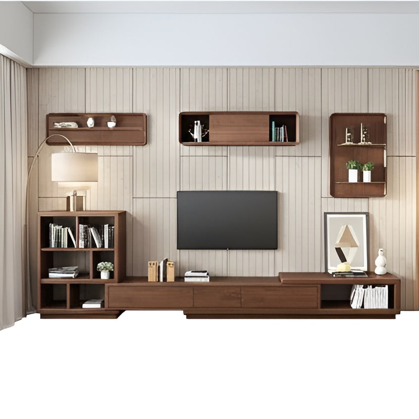 Wooden entertainment center with shelves and a TV in a living room setting.