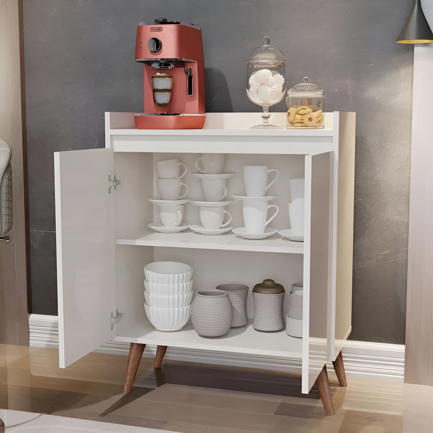 White cabinet with a red espresso machine and kitchenware on a gray wall background
