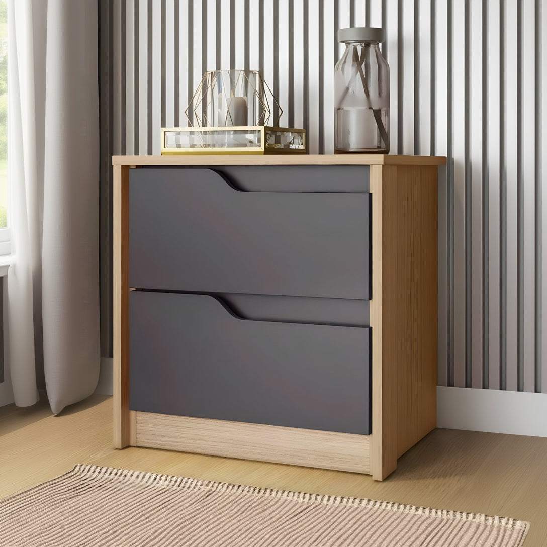 Two-drawer dresser with gray drawers and wooden frame against a striped wall.