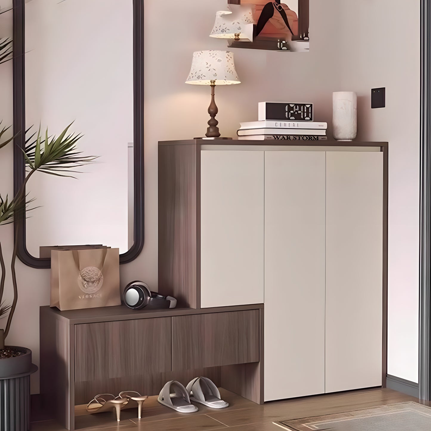 Modern interior with a shoe cabinet, mirror, and decorative items.