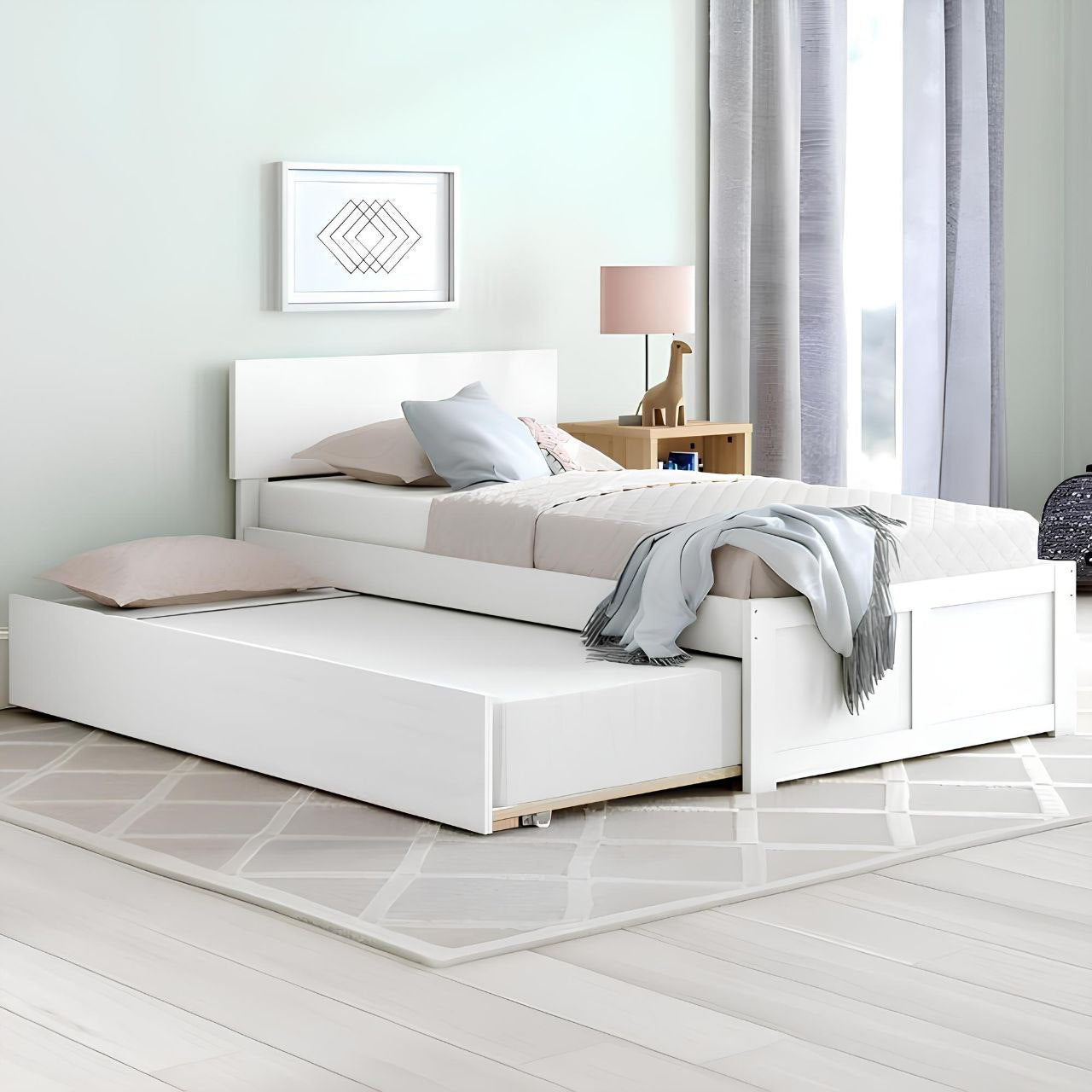 White bed with storage drawers in a bedroom setting
