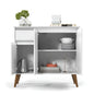 White sideboard with wooden legs containing decorative items on a white background