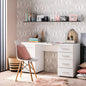 Modern home office with white desk, chair, and decorative elements.