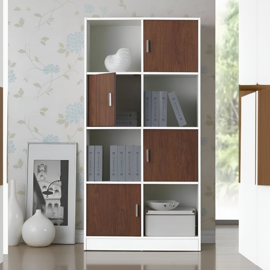 Modern bookshelf with wooden and white sections in a room with floral wallpaper.