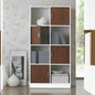 Modern bookshelf with wooden and white sections in a room with floral wallpaper.