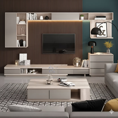 Modern living room with a television and decorative shelves.