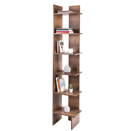 Wooden bookshelf with books and decor items on a white background