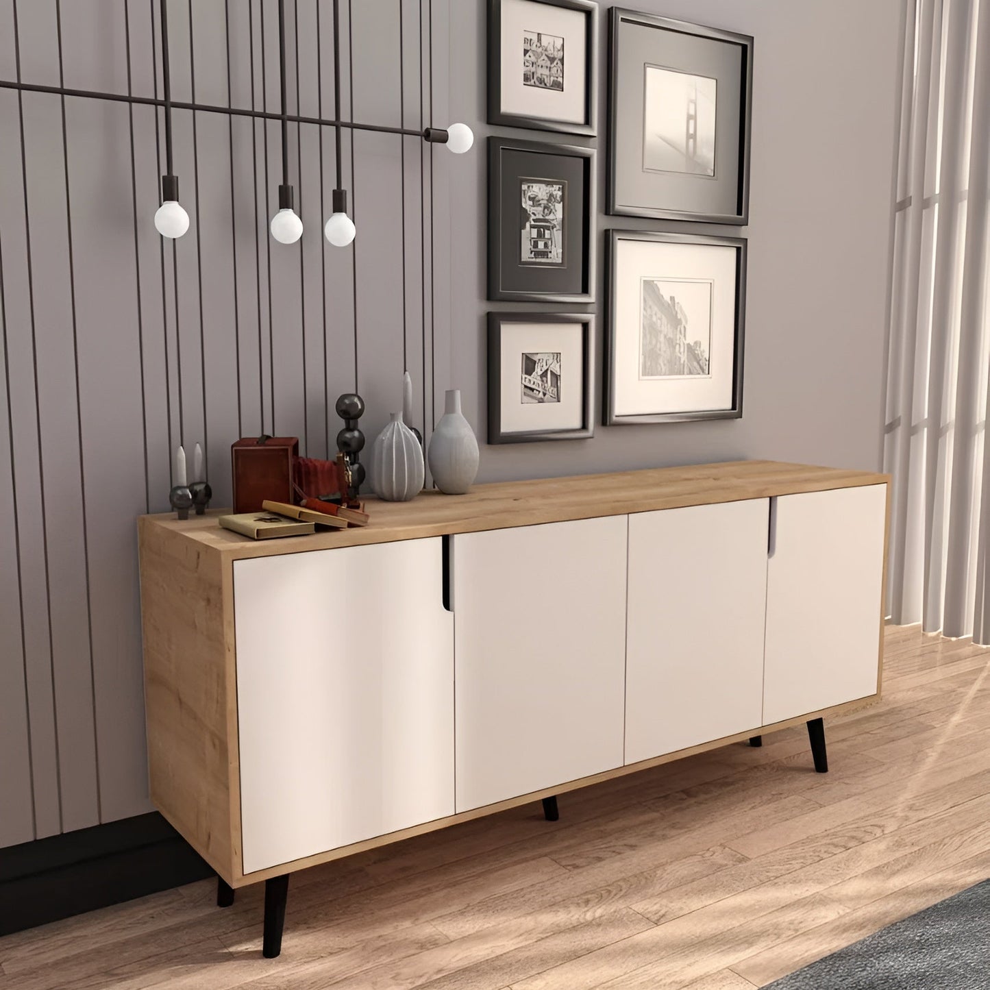 Modern sideboard with white doors and wooden top in a room with framed pictures on the wall.