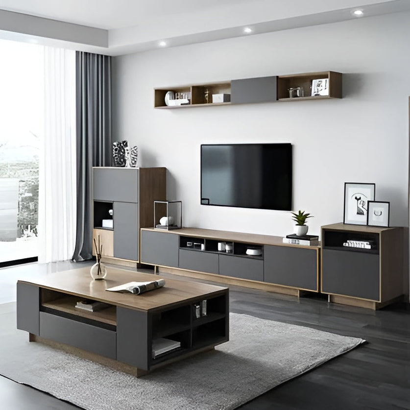 Modern living room with gray and brown furniture, including a TV stand and cabinets.