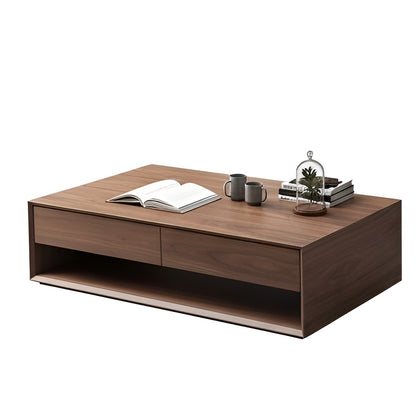 Wooden coffee table with items on a white background