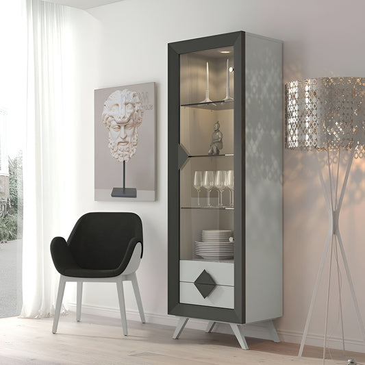 Modern interior with a tall display cabinet, black chair, and wall art.
