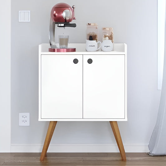 White cabinet with wooden legs holding a coffee maker and jars against a light gray wall.