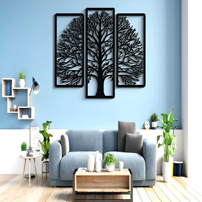 Living room with a blue sofa, wooden coffee table, and decorative wall art of trees.