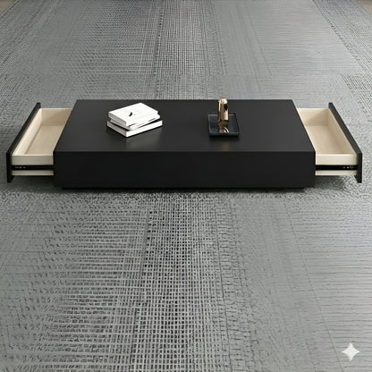 Black coffee table with open drawers on a gray textured floor