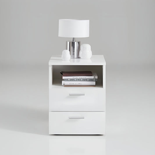 White nightstand with a lamp and books on a gray background