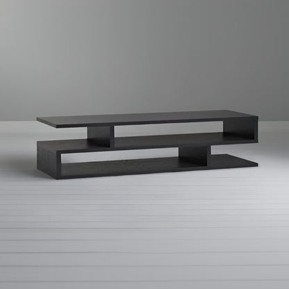 Modern black TV stand against a gray background
