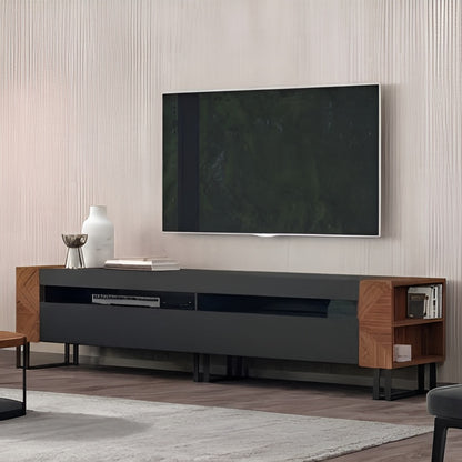 Modern living room with a large flat-screen TV mounted on the wall above a wooden entertainment console.