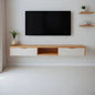 Modern living room with a flat-screen TV mounted on the wall above a wooden entertainment console.