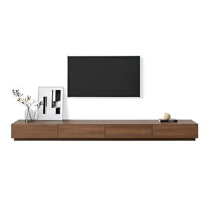 Wooden TV stand with a television mounted on a white wall.