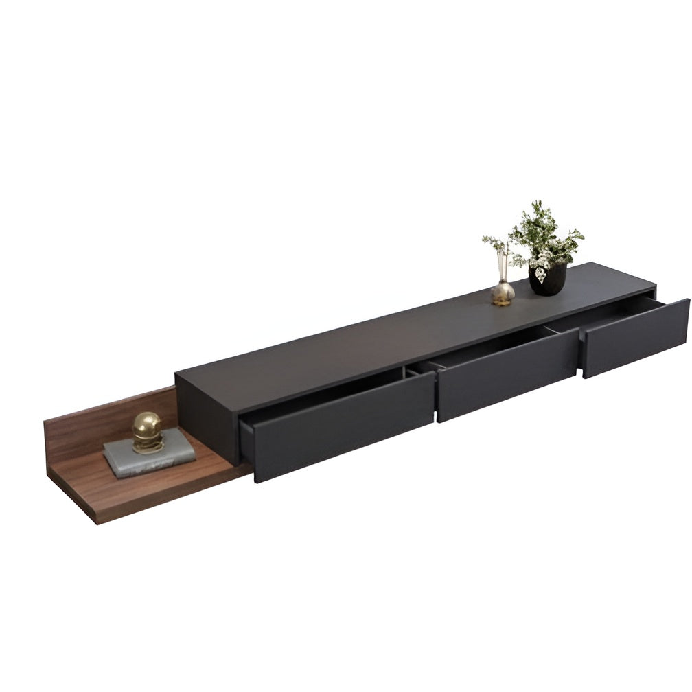 Black entertainment console with wooden shelf and decorative items on a white background