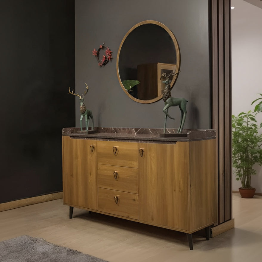 Wooden sideboard with marble top in a room setting