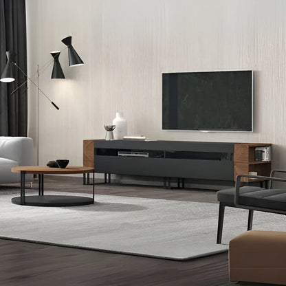 Modern living room with a TV, sofa, and armchair.