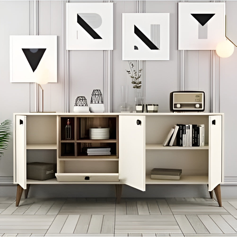 Modern white sideboard with open doors displaying decor items against a light gray wall with geometric art.