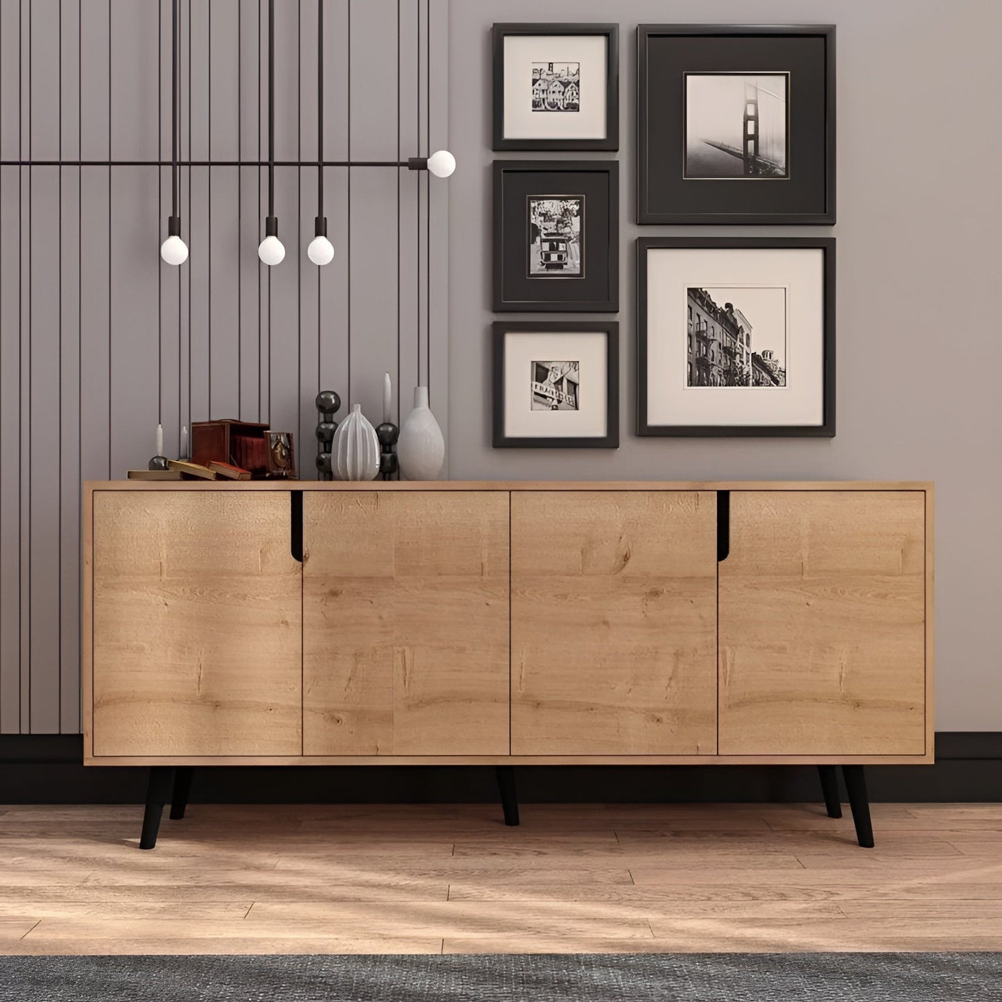 Wooden sideboard in a room with framed pictures on the wall.