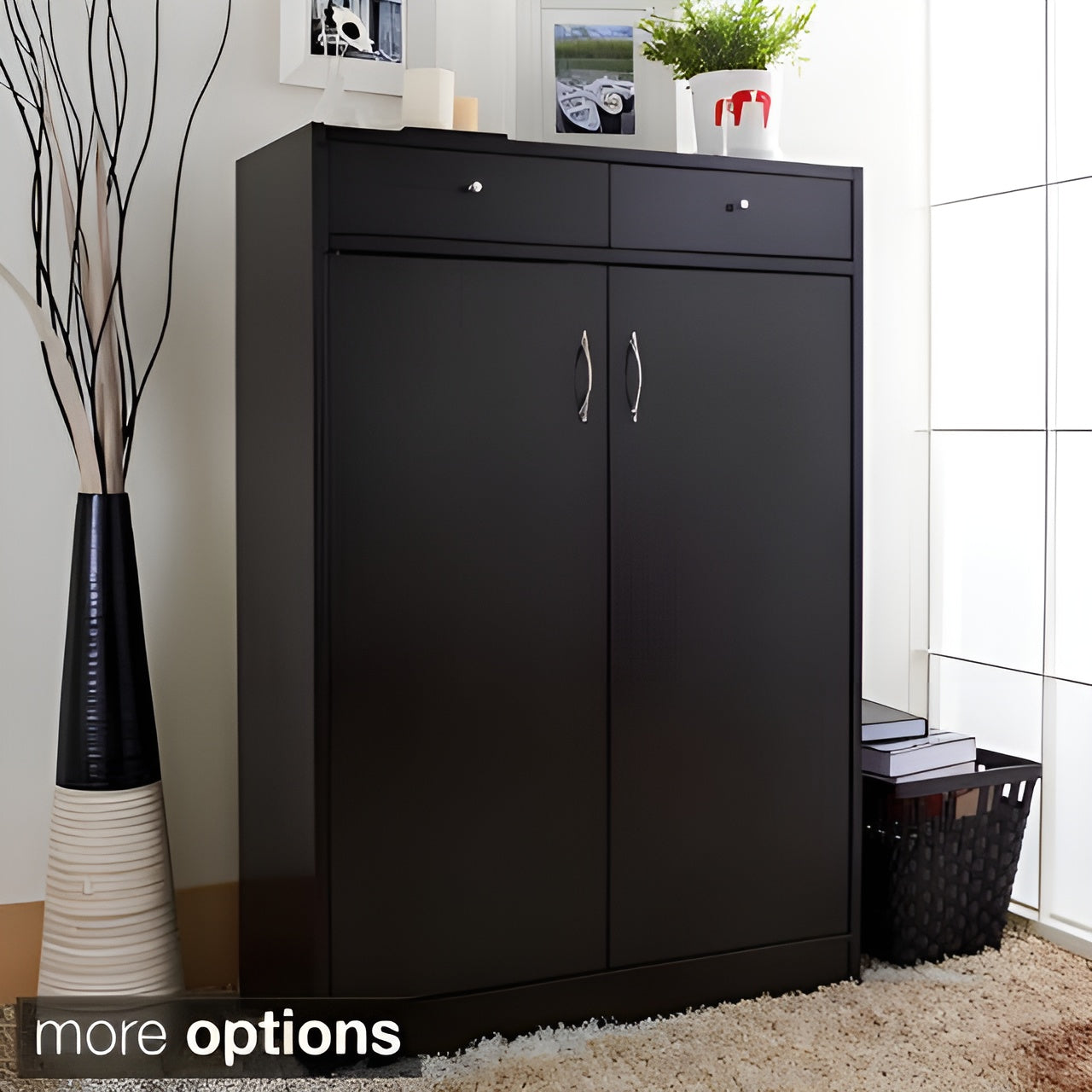 Black shoe cabinet in a room with decorative elements