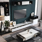 Modern living room with white entertainment console, TV, and decor items.