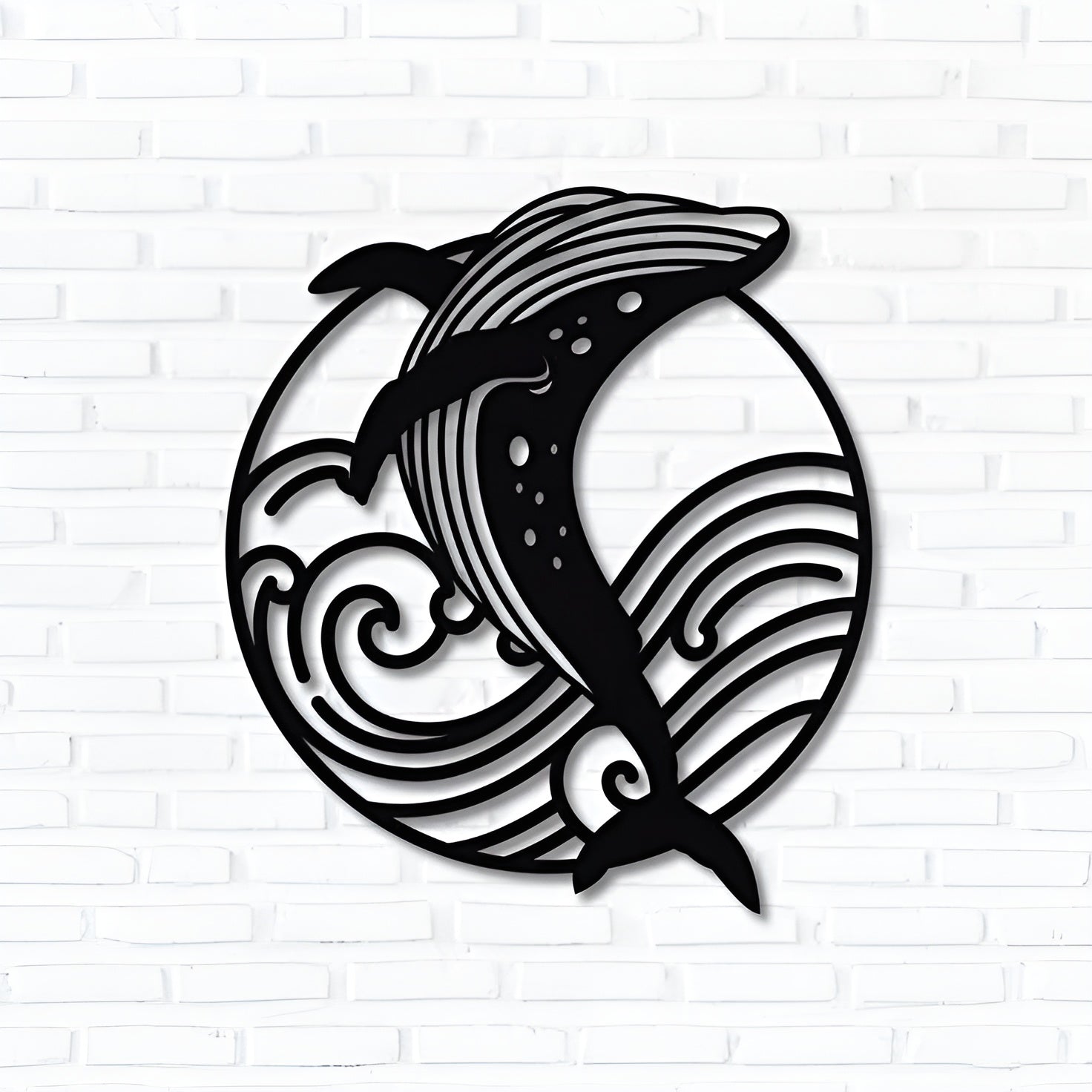 Black silhouette of a dolphin in a circular design with wave patterns on a white brick wall background.