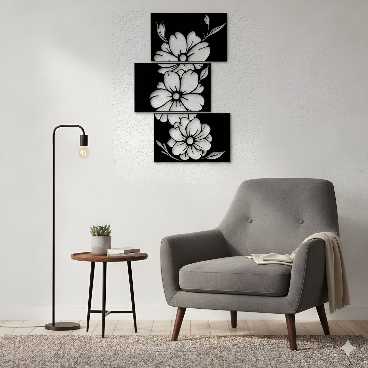 Gray armchair in a room with wall art and a floor lamp.