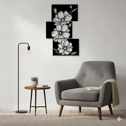 Gray armchair in a room with wall art and a floor lamp.