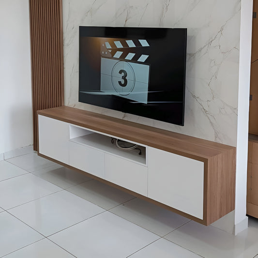 Modern TV stand with a wooden finish and white panels against a marble wall.