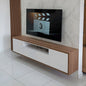 Modern TV stand with a wooden finish and white panels against a marble wall.