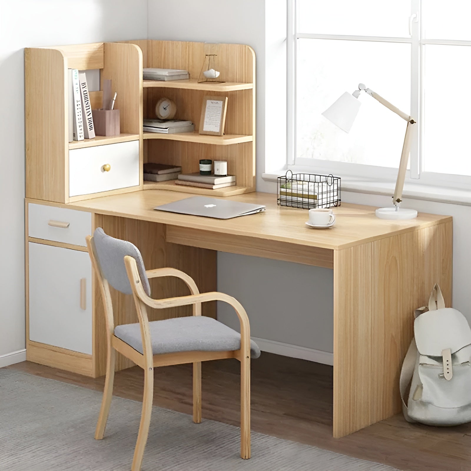 Wooden desk with shelves, chair, and lamp in a room with a window.