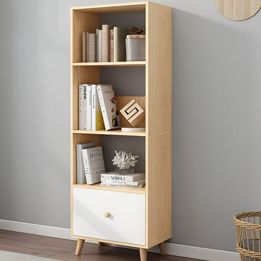 Wooden bookshelf with books and decor against a gray wall