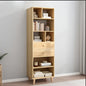 Wooden bookshelf with shelves and a drawer against a gray wall.