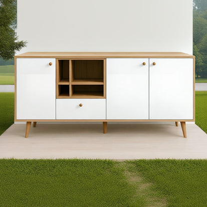 Wooden sideboard with white doors on a plain background