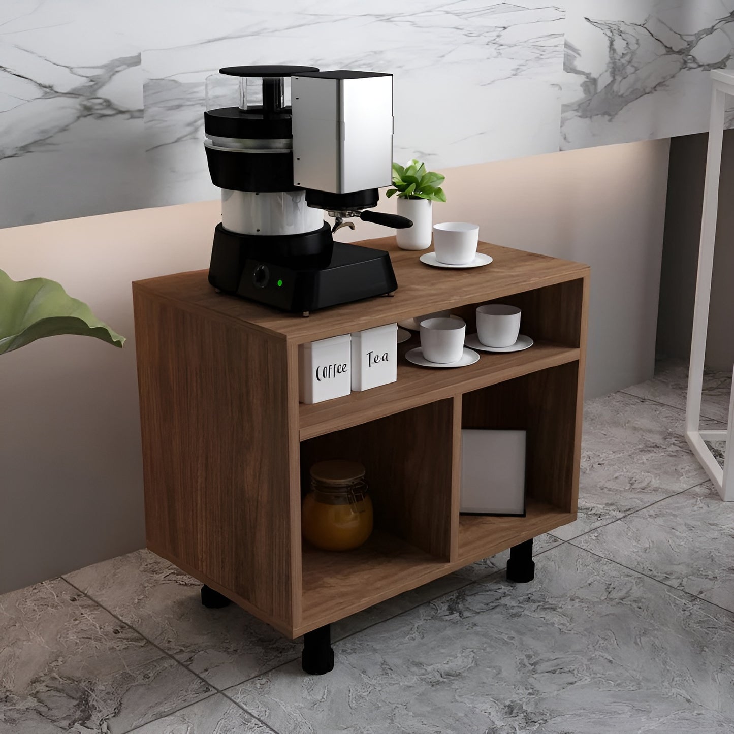 Coffee maker on a wooden side table with cups and a plant in a modern interior setting.