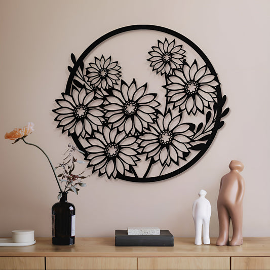 Decorative wall art with floral design on a beige wall above a wooden shelf.