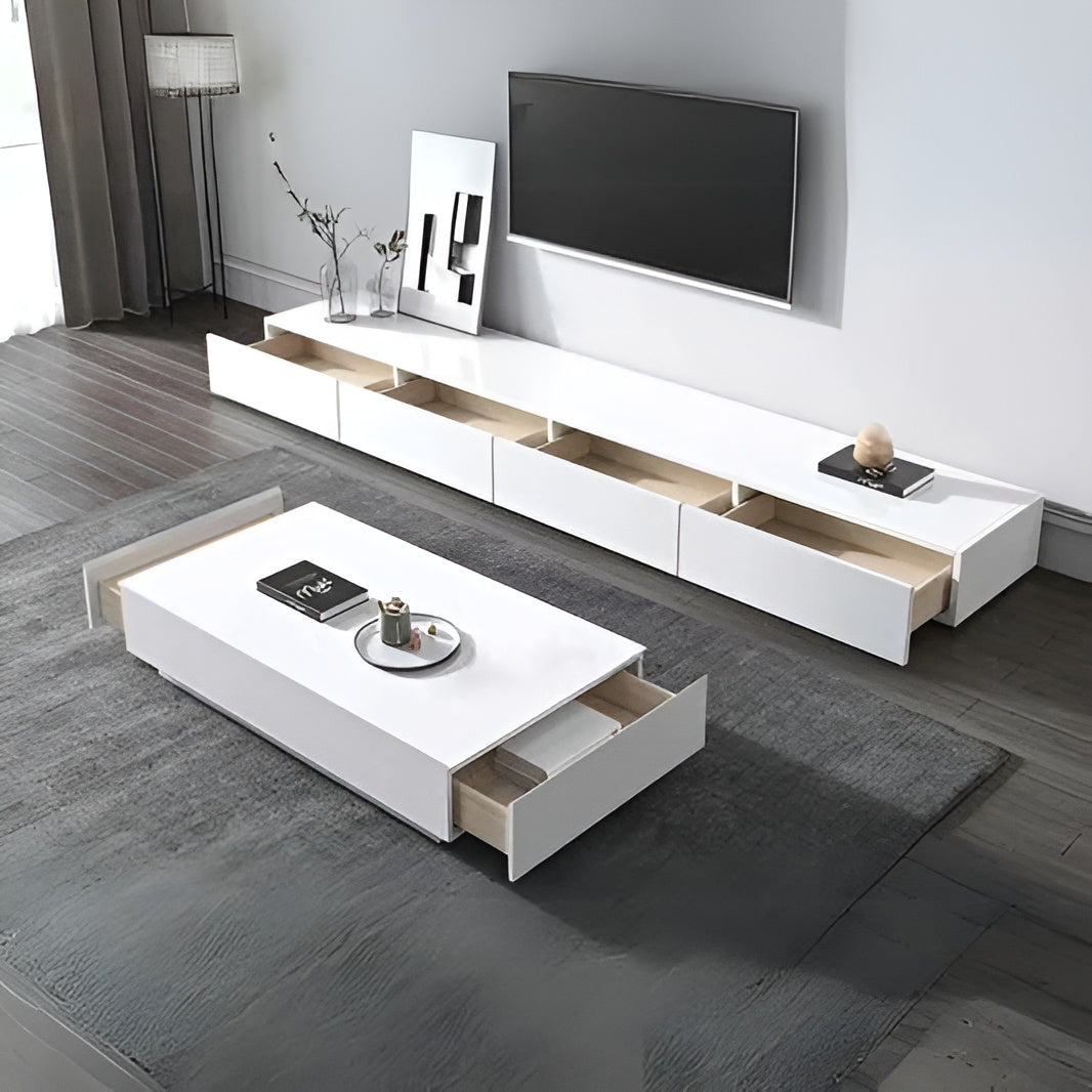 Modern living room with white TV stand and coffee table.