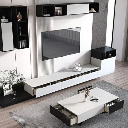 Modern living room with a white entertainment console, TV, and coffee table.