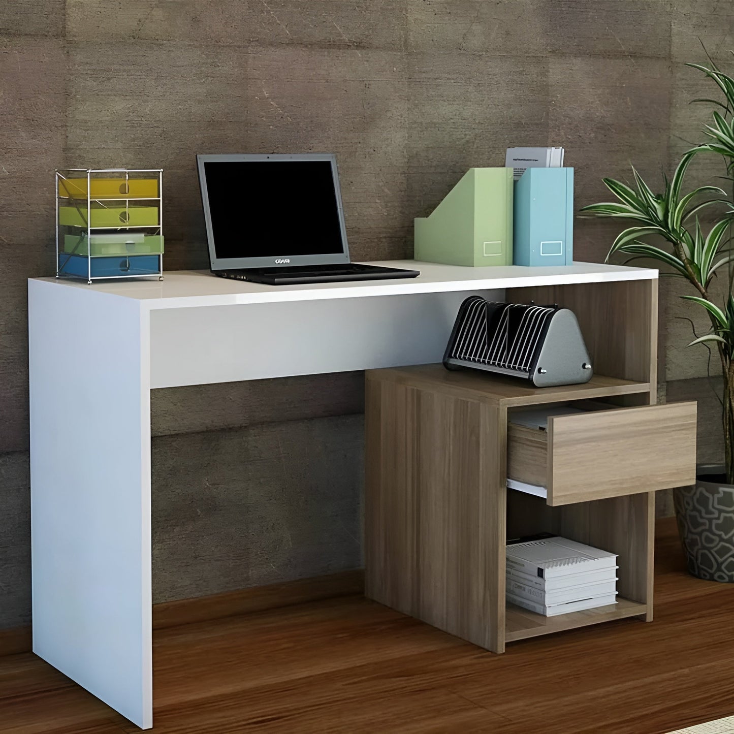 White L-shaped desk with wooden side unit, laptop, and office supplies against a brown wall.