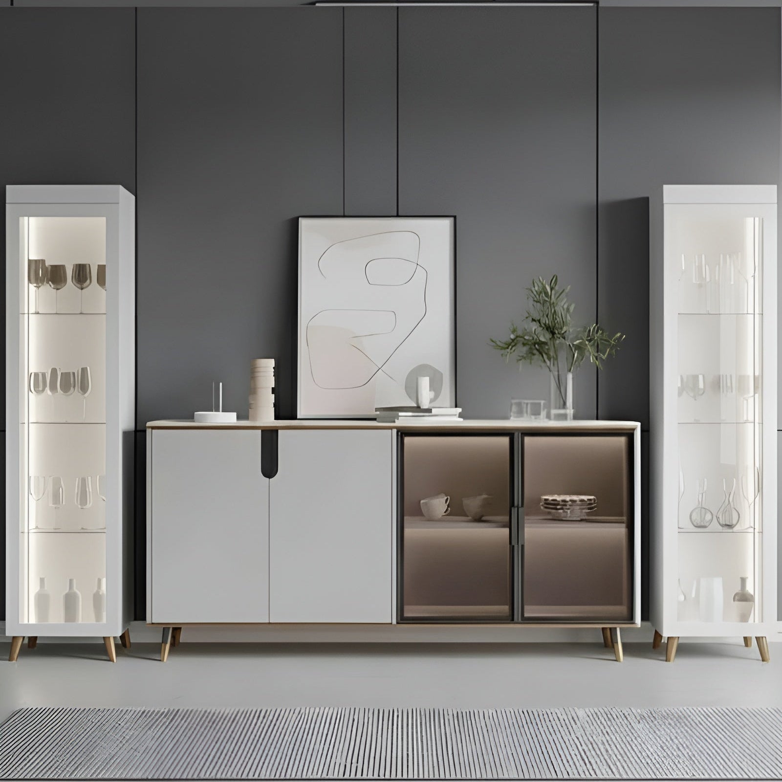 Modern interior with a sideboard, decorative items, and wall art against a gray wall.