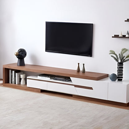 Modern living room with a wooden and white TV stand, television, and decorative items.