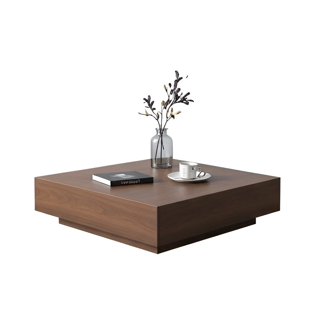 Wooden coffee table with a vase, book, and cup on a white background