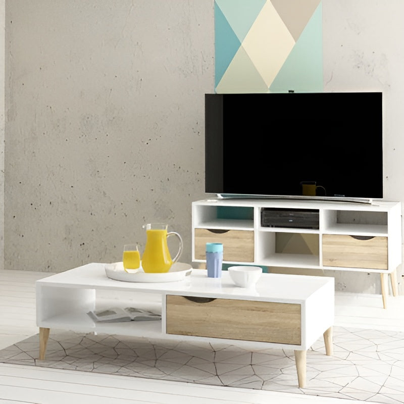Modern living room with a white TV stand, coffee table, and geometric wall art.