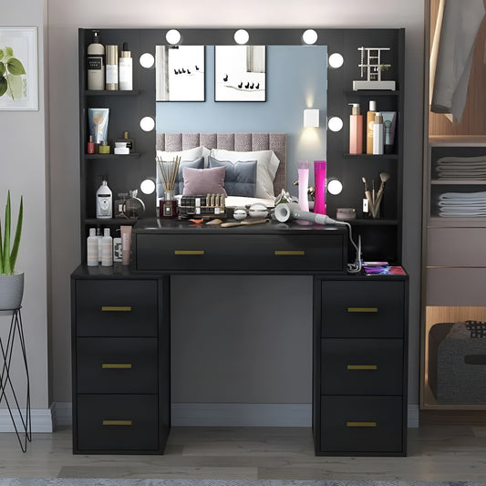 Black vanity desk with mirror and lights in a bedroom setting